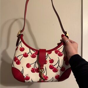 Coach Cherry Hampton